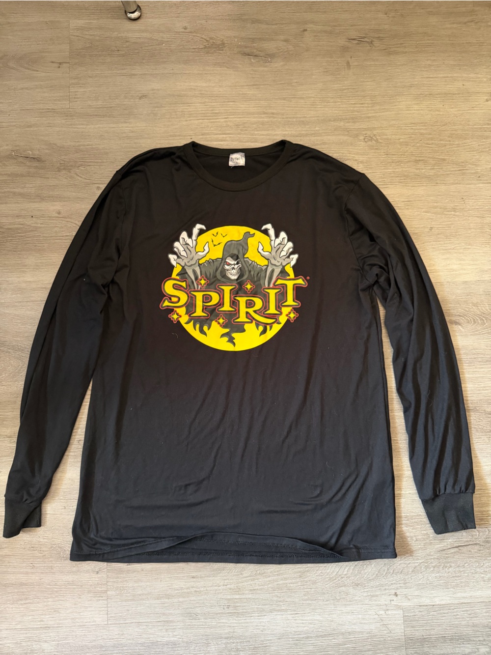 Spirit Black Long Sleeve Tee with Yellow and Red Graphic